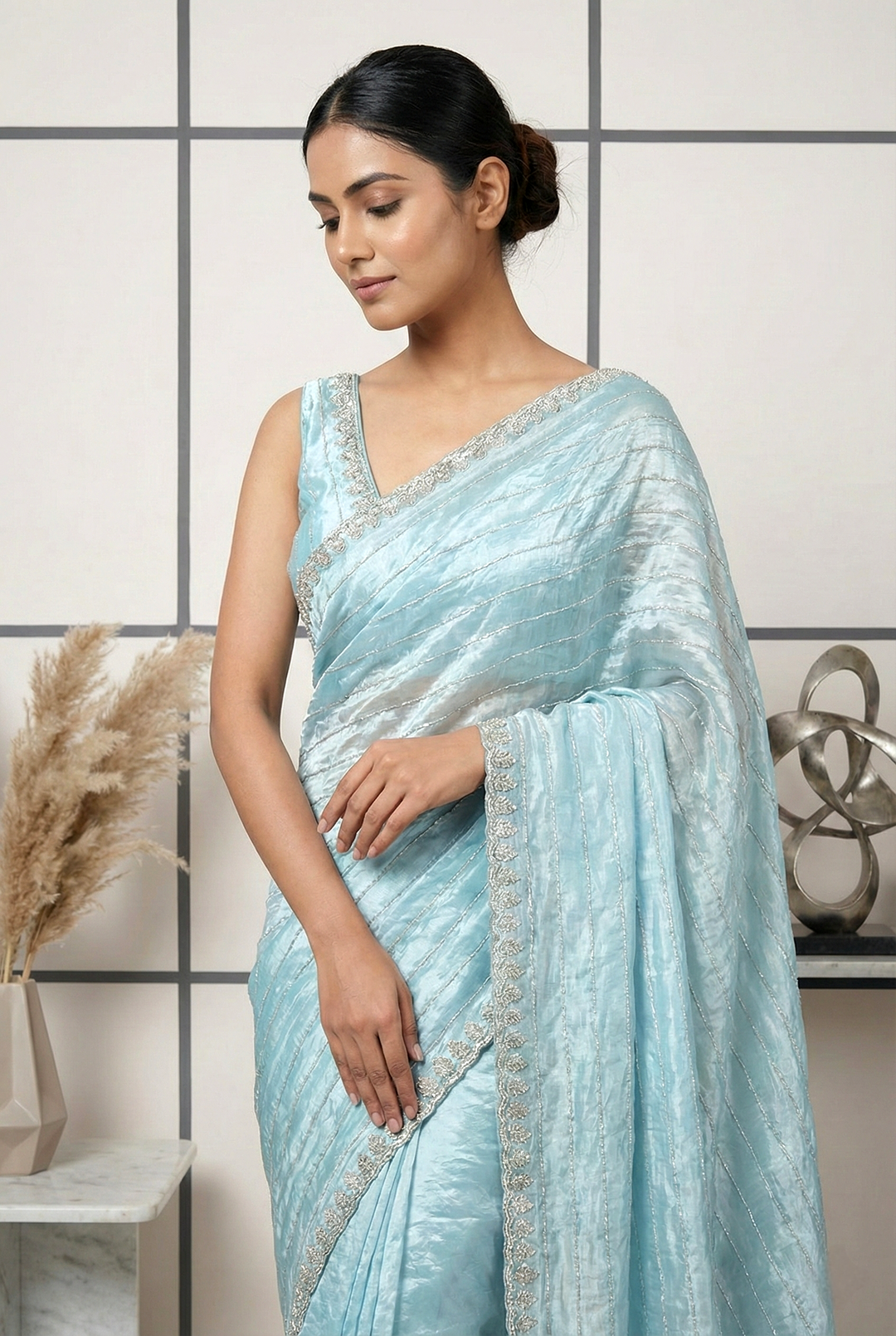 Neerus Blue organza embellished saree - back view
