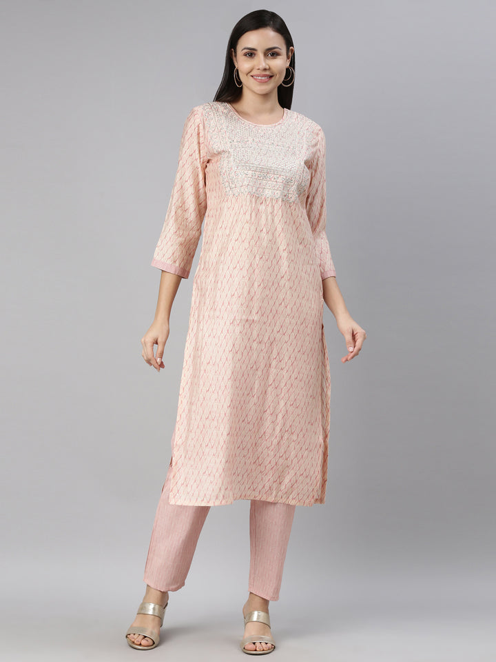 Neerus Orange embroidered kurta set with trousers - front view