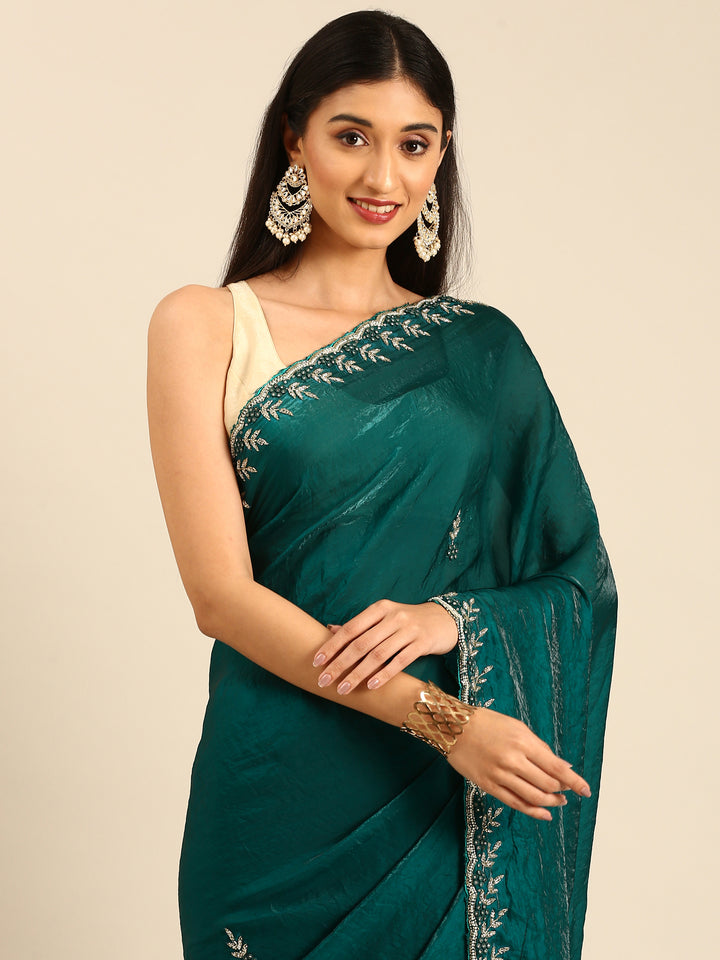 Green shimmer tissue saree with cut Dana & Swarovski embroidery