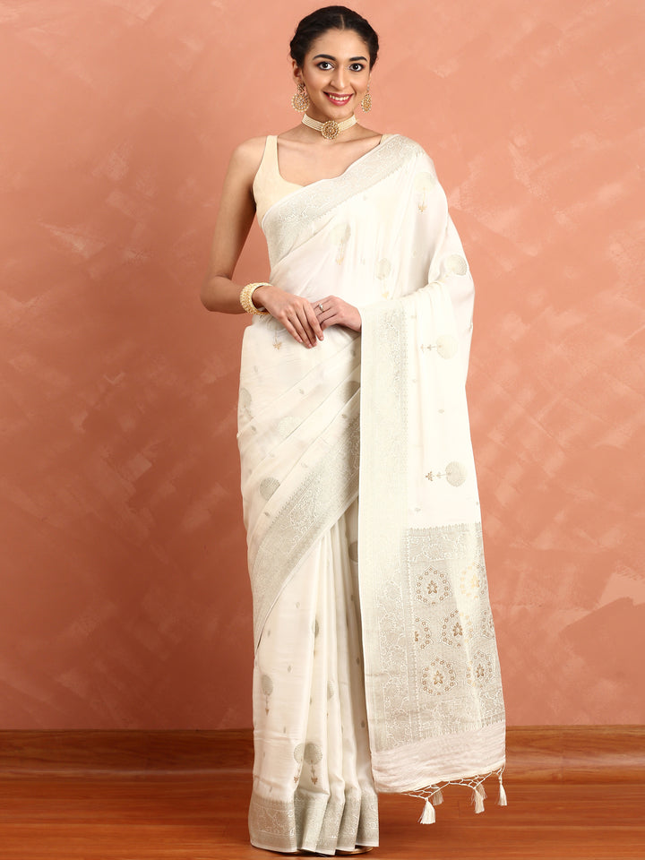 White Banaras silk saree with zari motifs and border