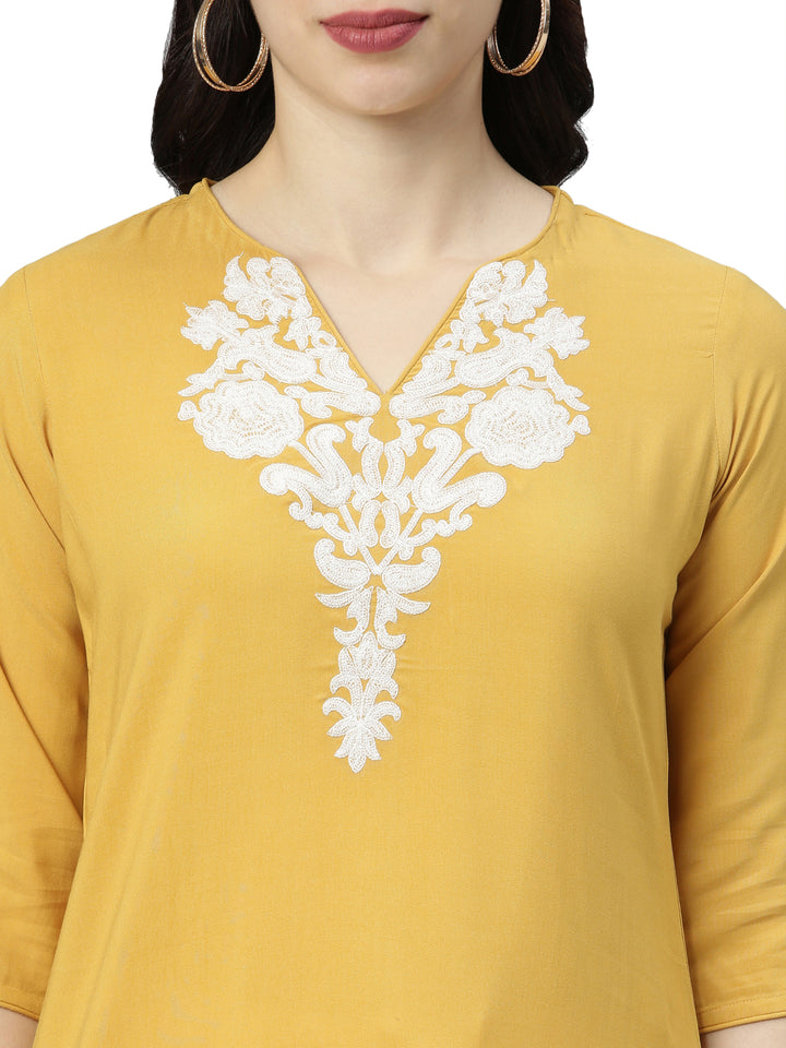 Neerus Yellow rayon thread embroidered kurti - back view
