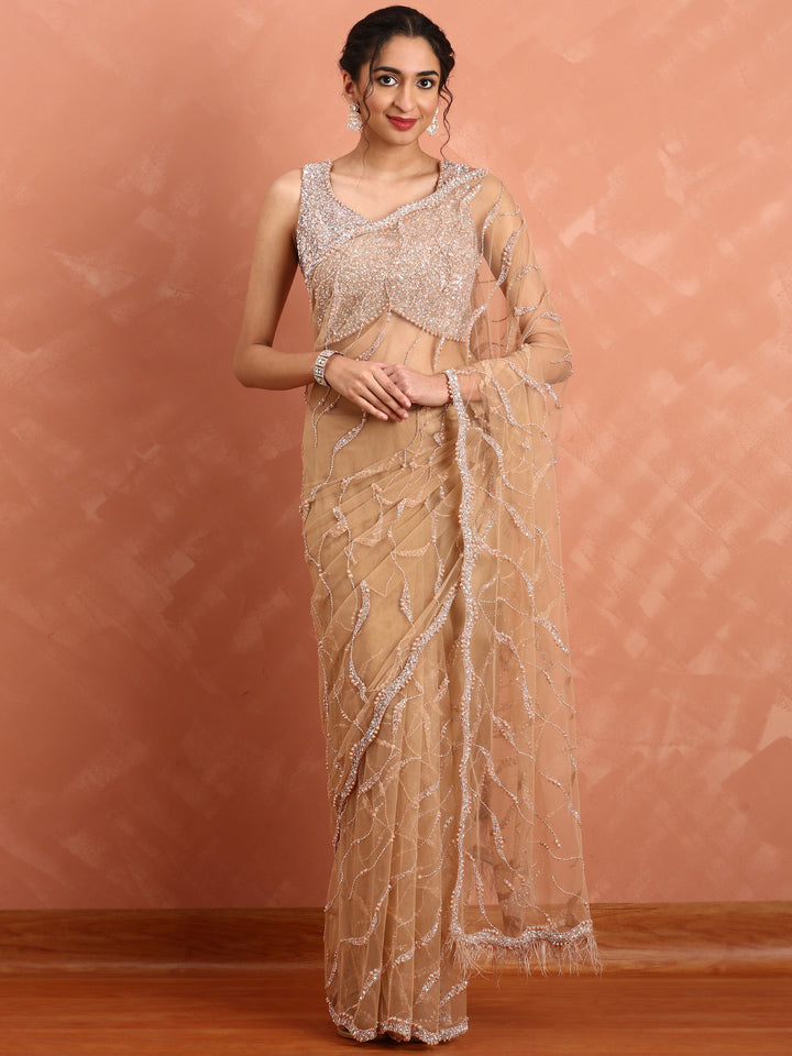 Onion pink net saree with pearl & cut Dana hand embroidery with Swarovski blouse