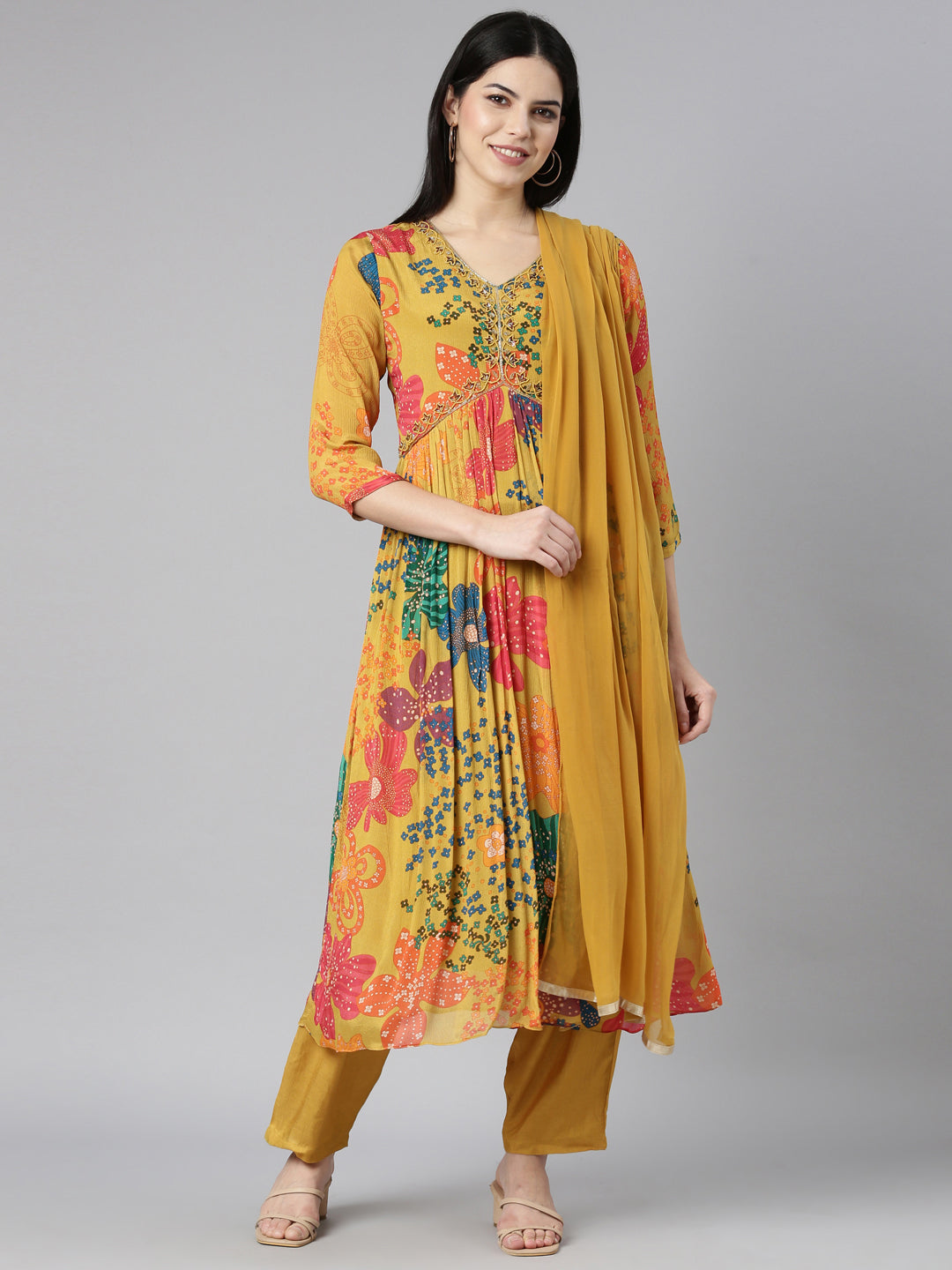 Neerus Mustard Pleated Straight Floral Kurta And Trousers With Dupatta