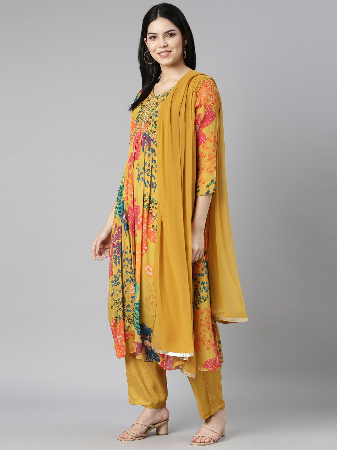 Neerus Mustard Pleated Straight Floral Kurta And Trousers With Dupatta