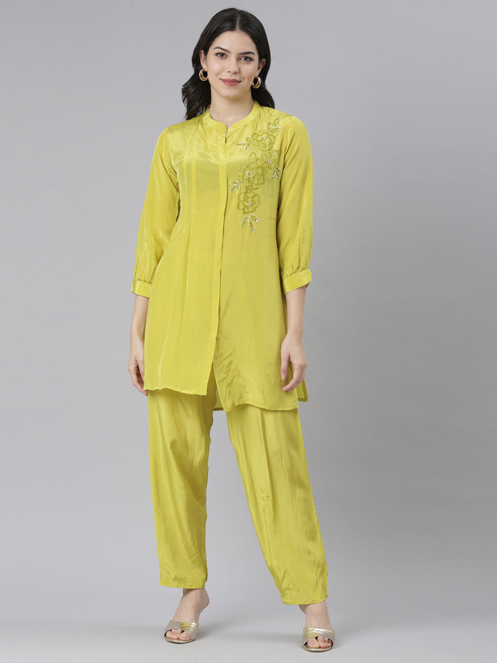 Neerus Green solid straight kurta set with trouser - front view