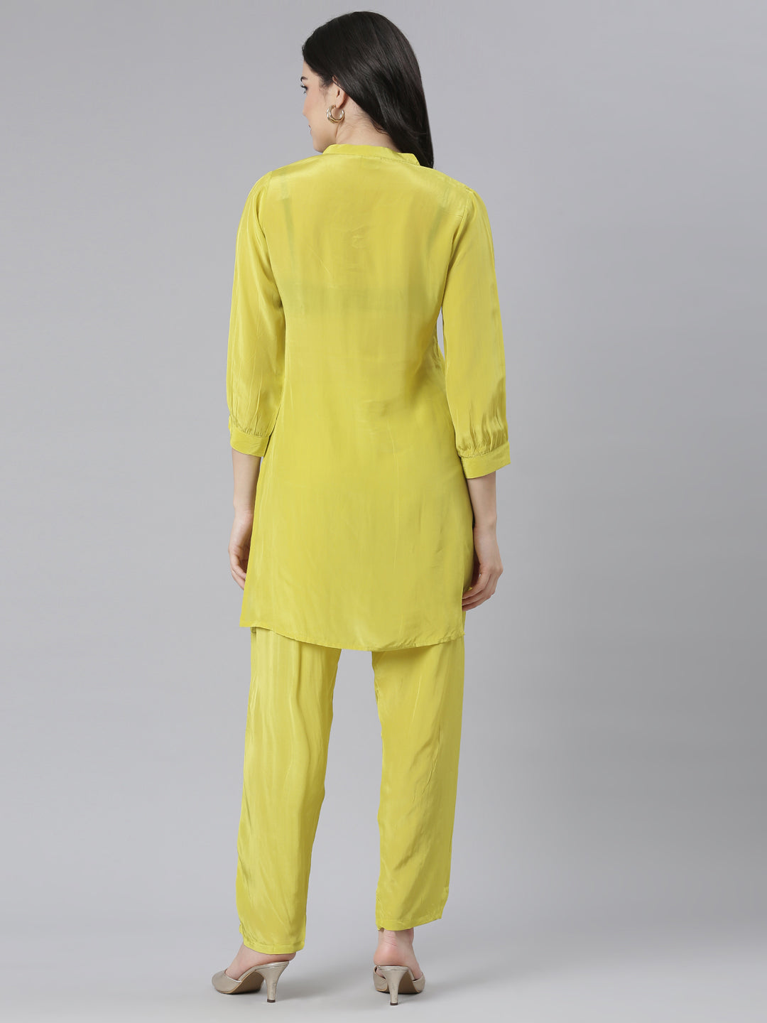 Neerus Green solid straight kurta set with trouser - side view