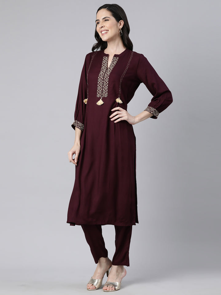Neerus Purple solid straight kurta set - back view