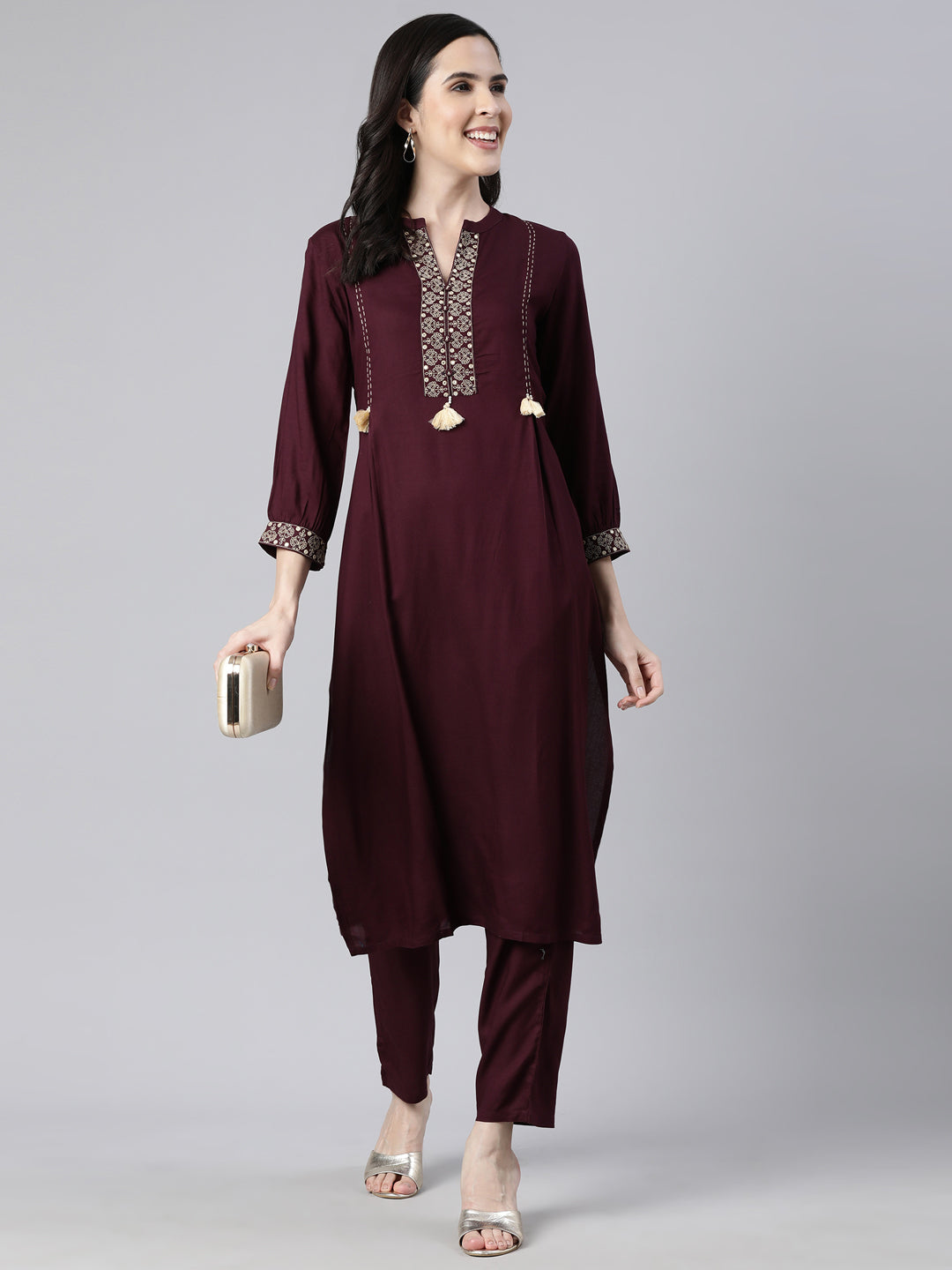 Neerus Purple solid straight kurta set - front view