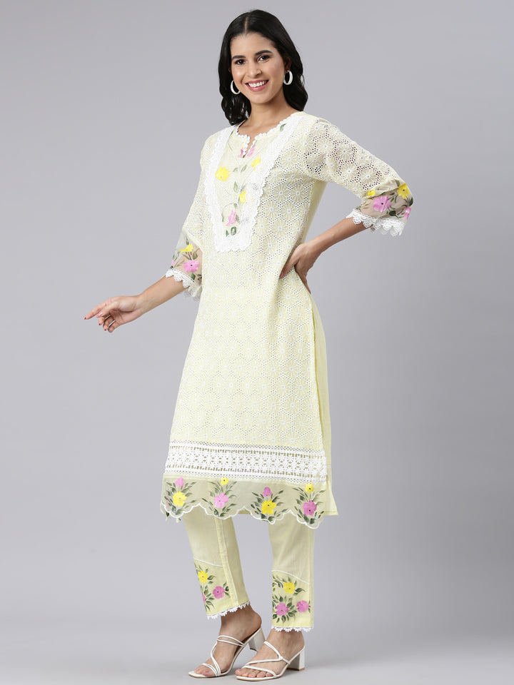 Neerus Yellow Regular Scalloped Solid Kurta and Trousers With Dupatta