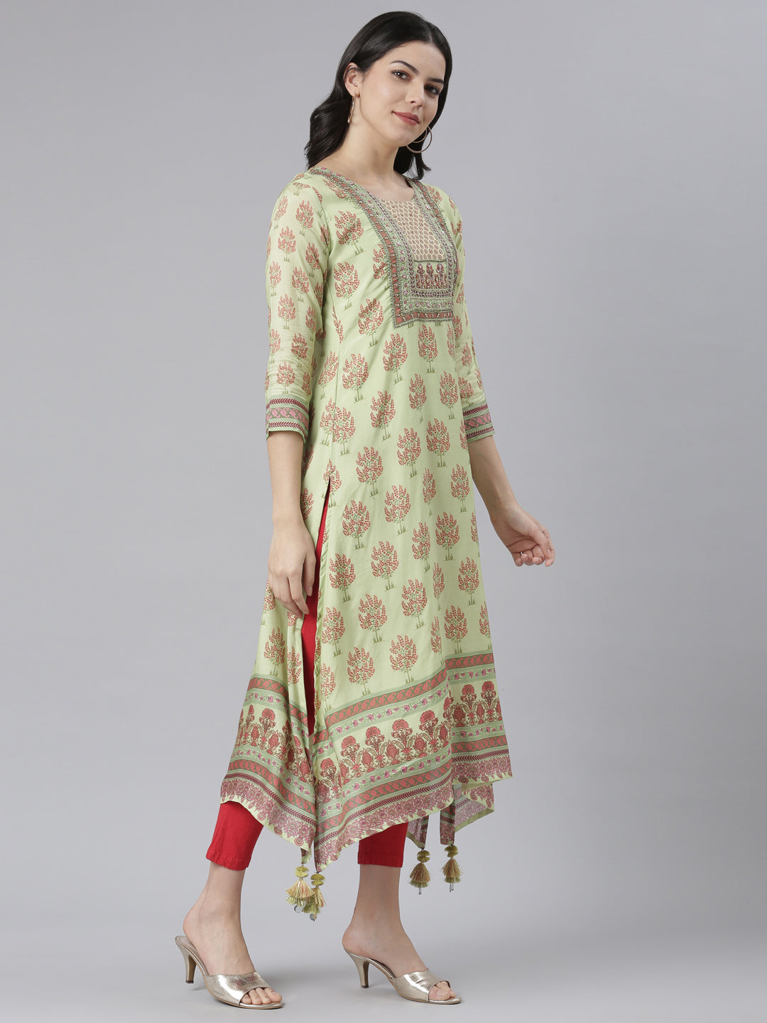 Neerus Green muslin printed high-low kurti - back view