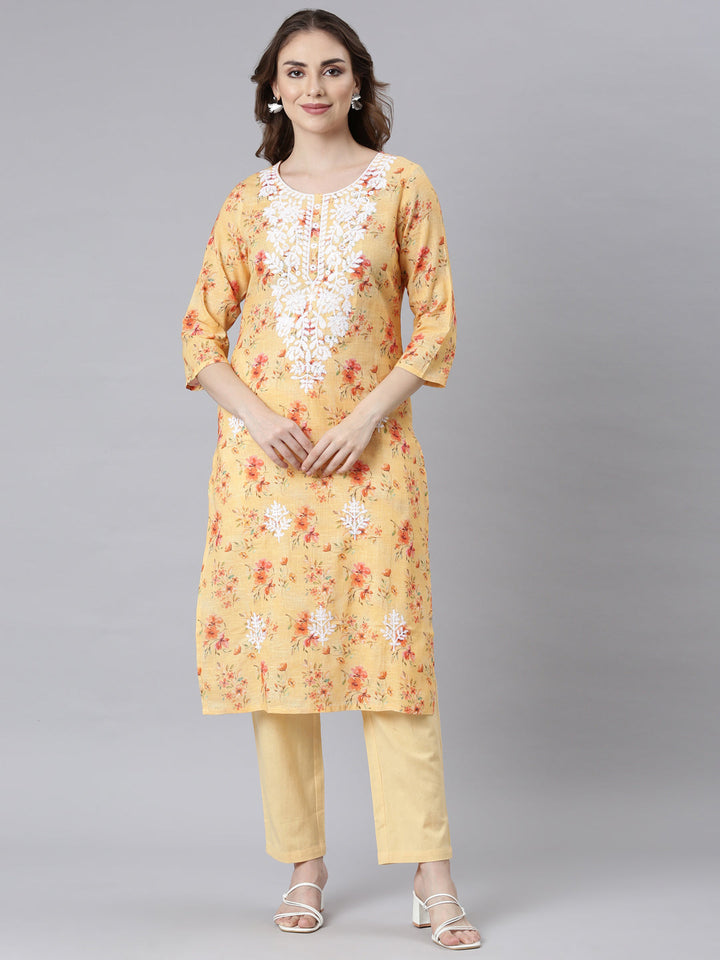 Neerus Multi Panelled Straight Floral Kurta And Trousers