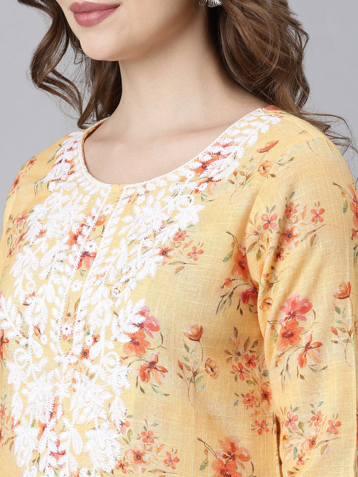 Neerus Multi Panelled Straight Floral Kurta And Trousers