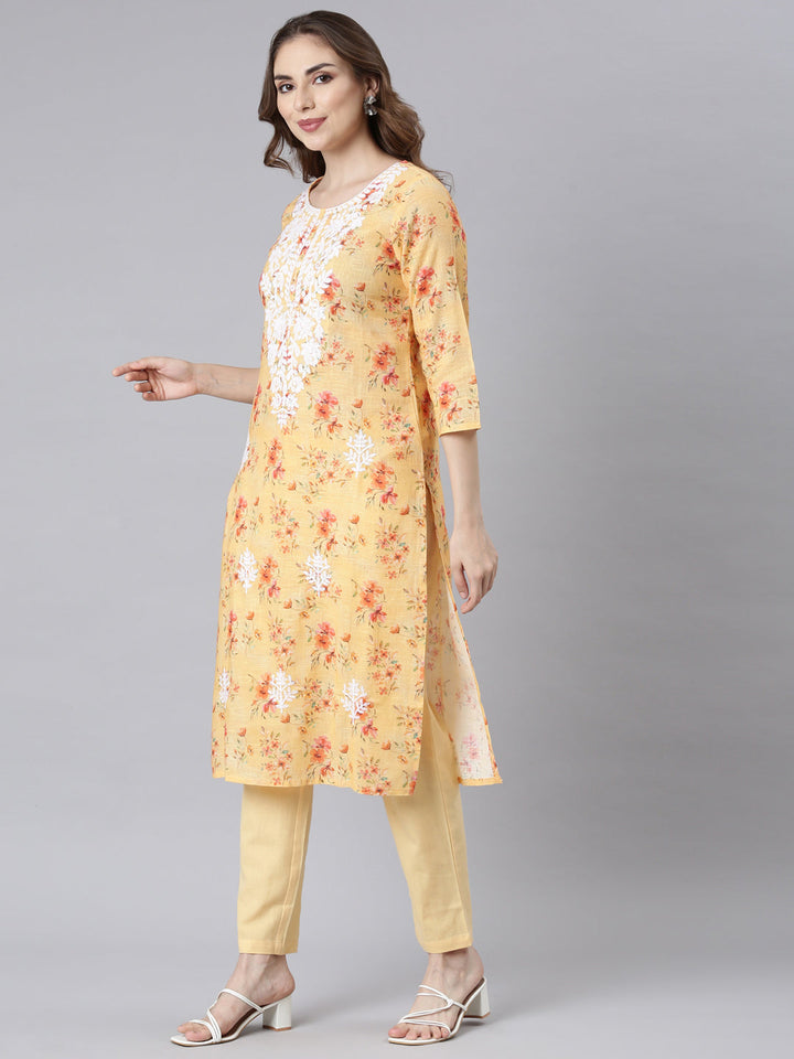 Neerus Multi Panelled Straight Floral Kurta And Trousers
