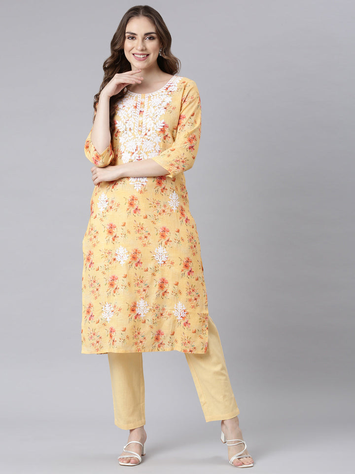 Neerus Multi Panelled Straight Floral Kurta And Trousers