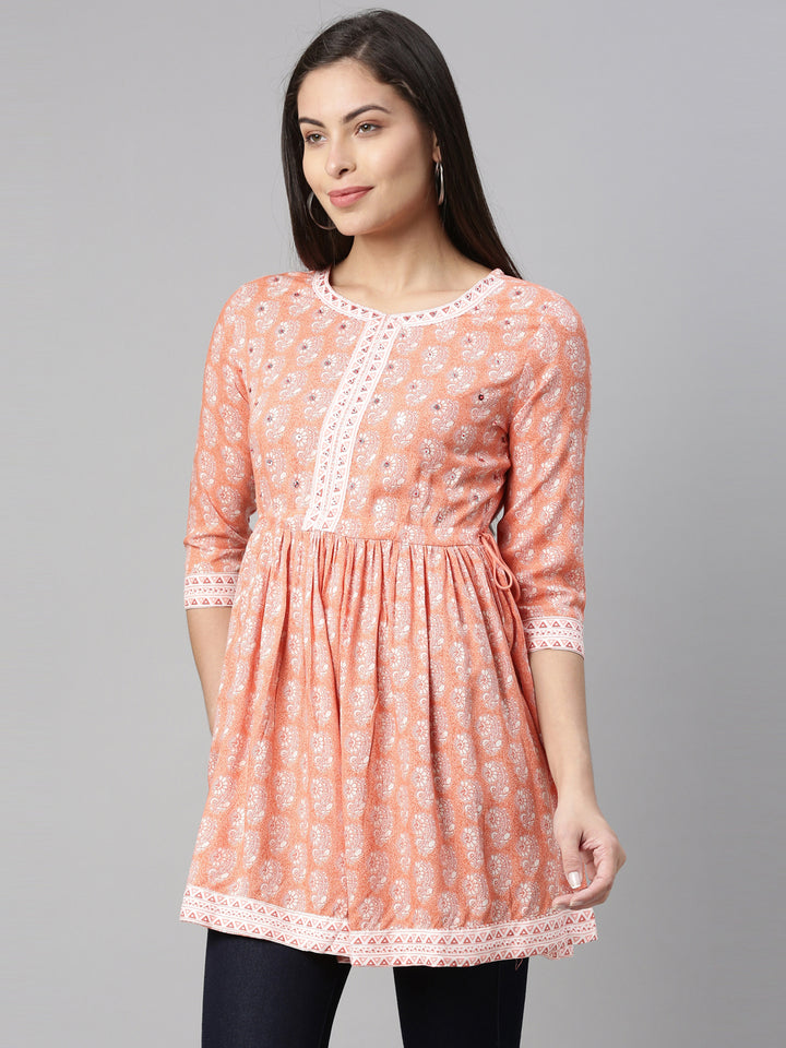 Neerus Women Coral  White Floral Printed Sequinned Pleated Kurti