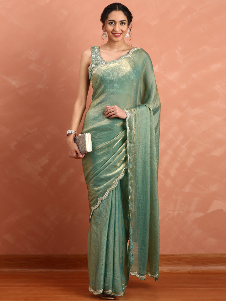 Green & gold Jimmy tissue saree with hand embroidery with ready made blouse