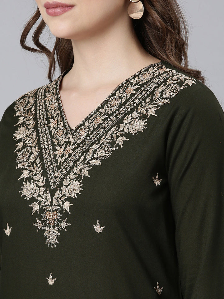 Neerus Green printed ethnic kurta set with churidar and dupatta - back view