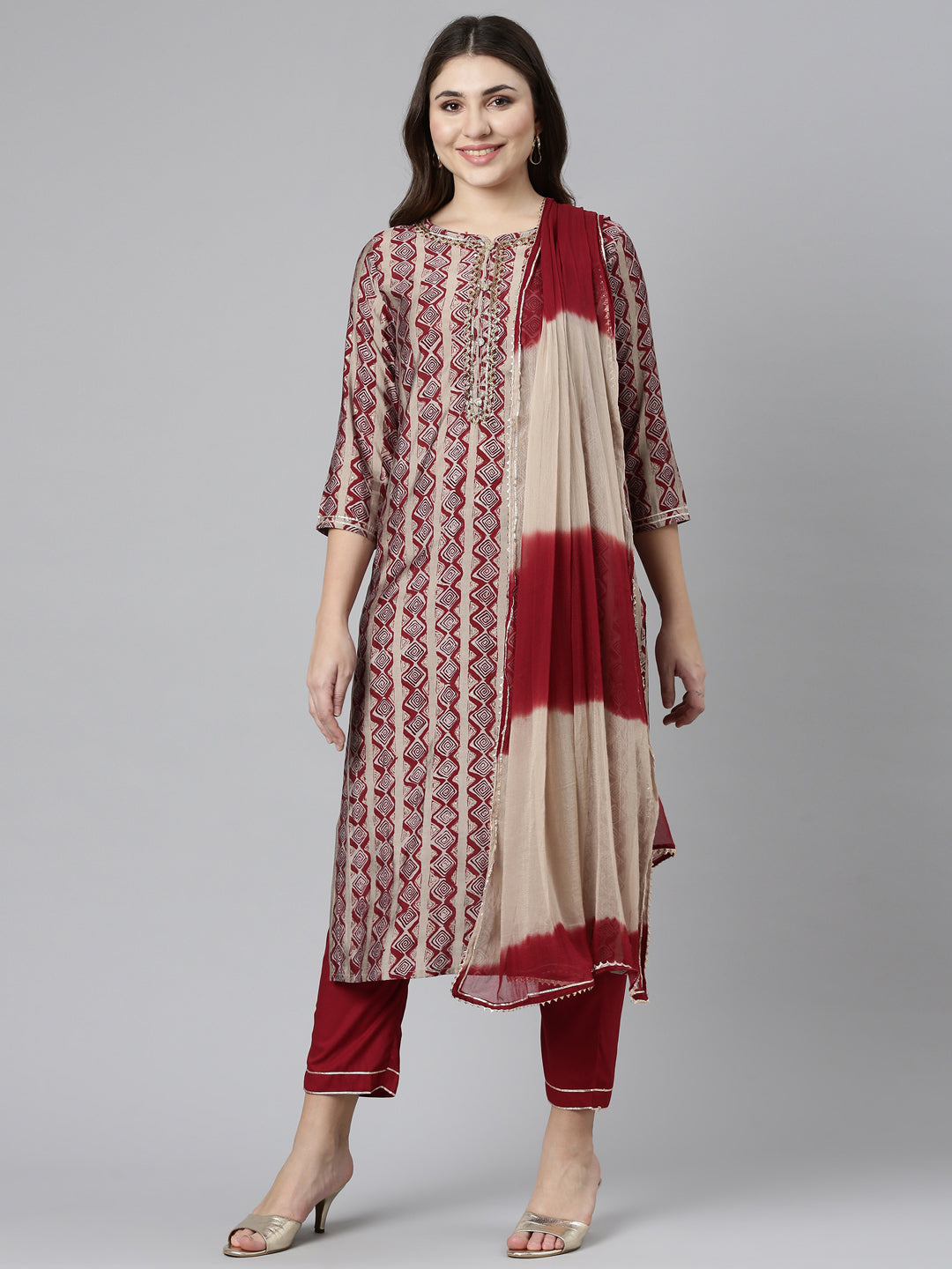 Neerus Maroon printed straight kurta set - front view