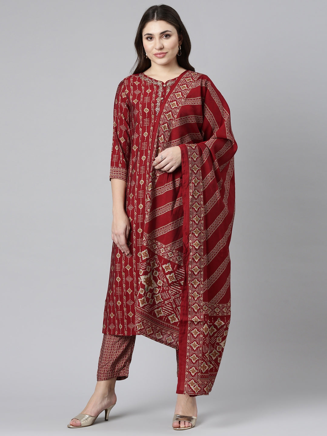 Neerus Maroon printed straight kurta set - front view
