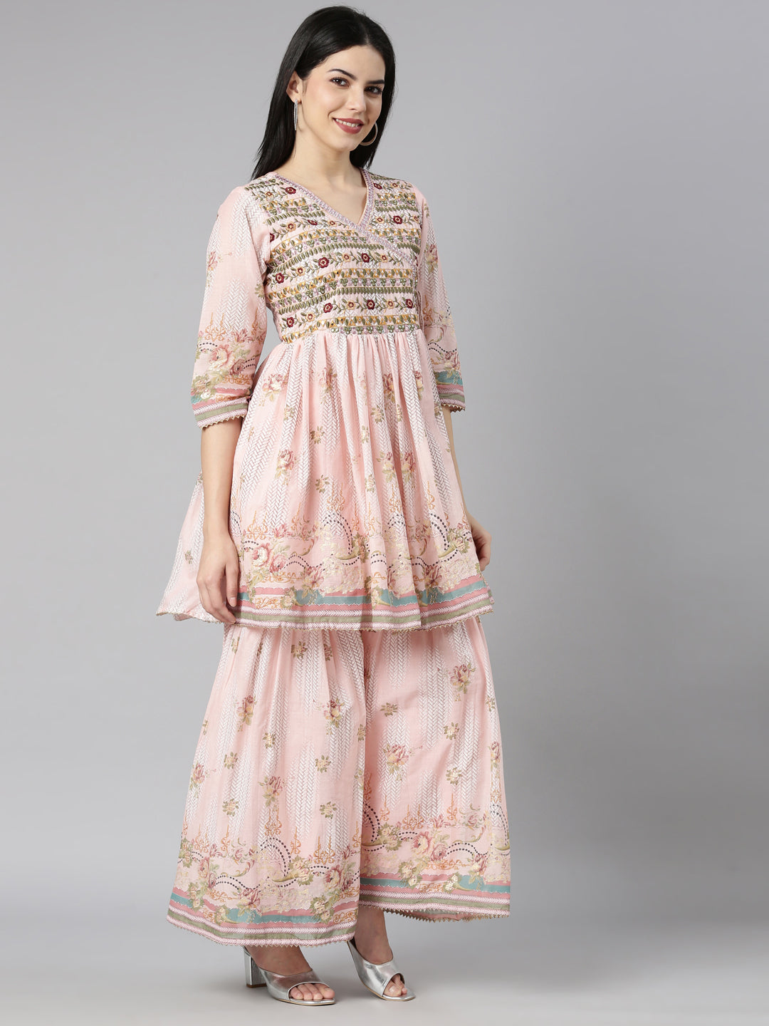 Neerus Orange cotton printed kurta set with sharara and dupatta - back view