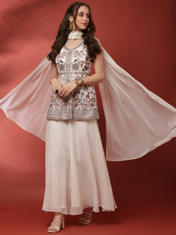 Off White Geogrette Peplum Palazzo Set With Embroiderey Work On Body