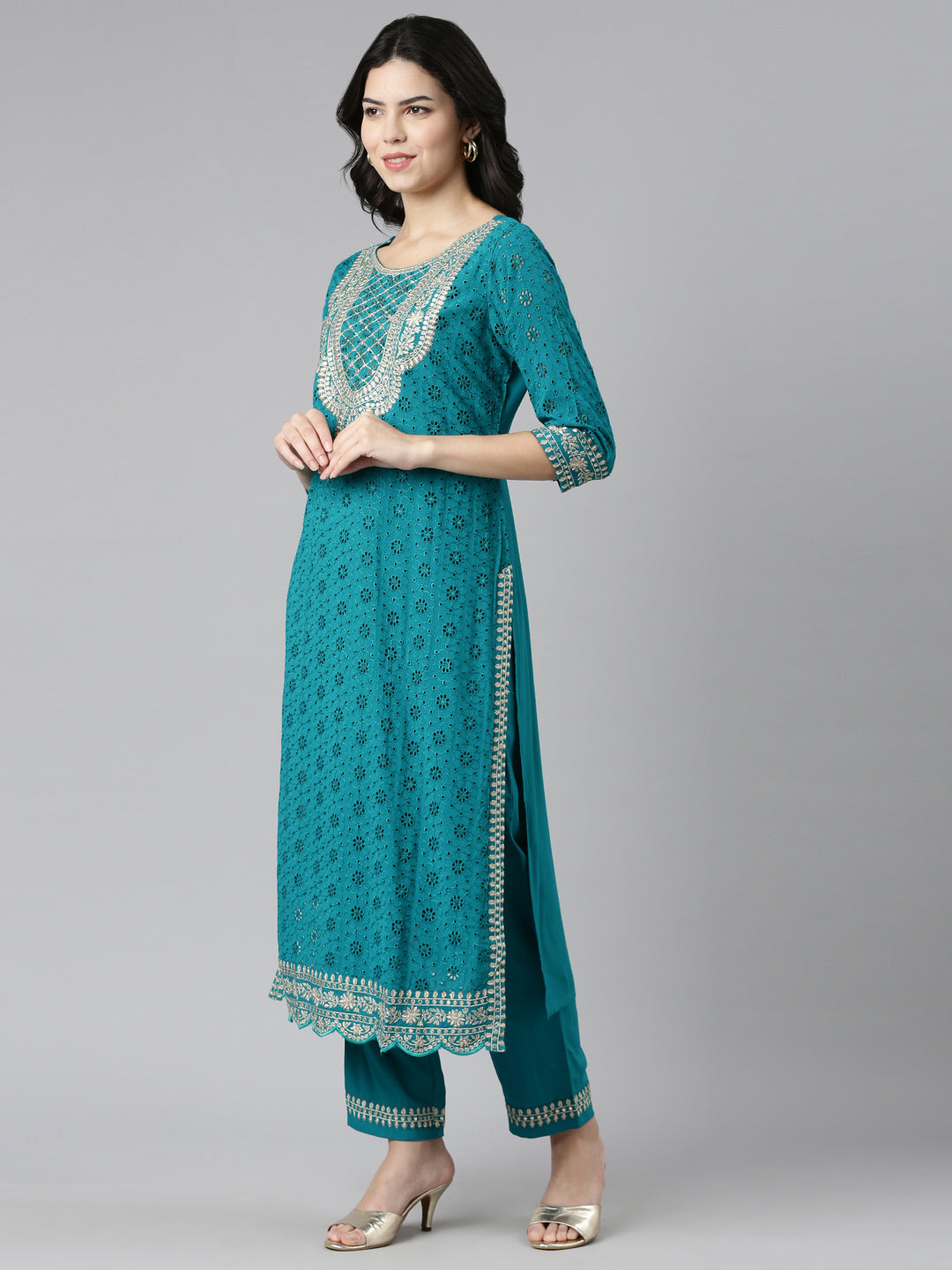 Neerus Green solid straight kurta set with trouser and dupatta - back view