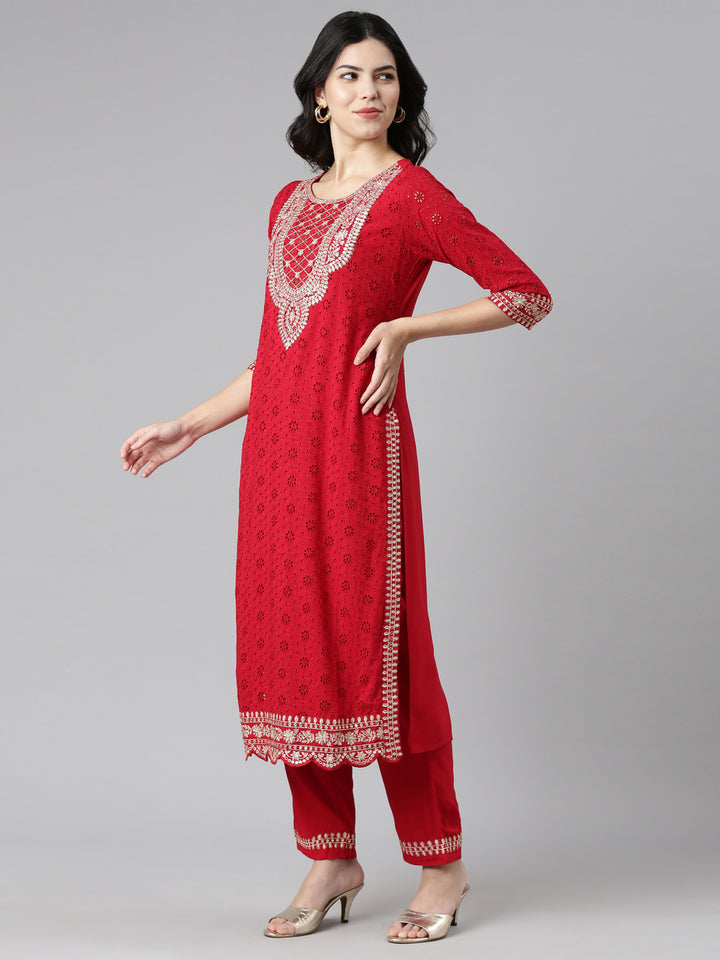 Neerus Red solid straight kurta set with trouser and dupatta - back view