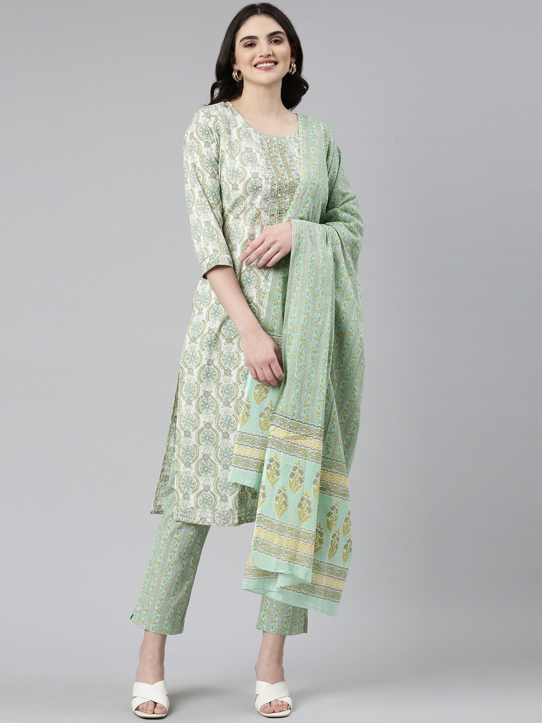 Neerus Green cotton printed kurta set with trouser and dupatta - front view