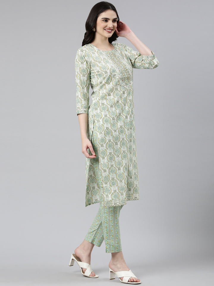 Neerus Green cotton printed kurta set with trouser and dupatta - back view