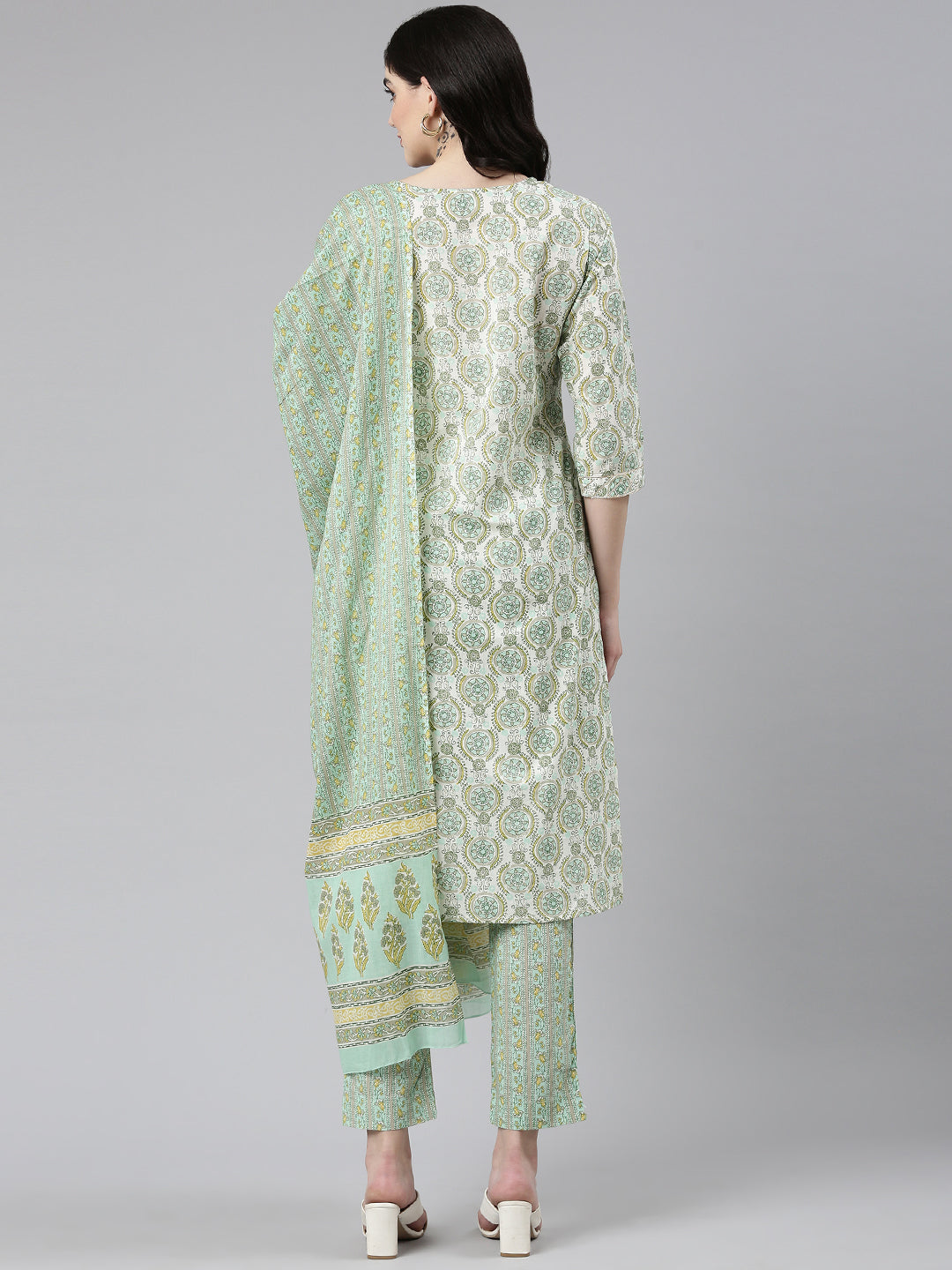 Neerus Green cotton printed kurta set with trouser and dupatta - side view