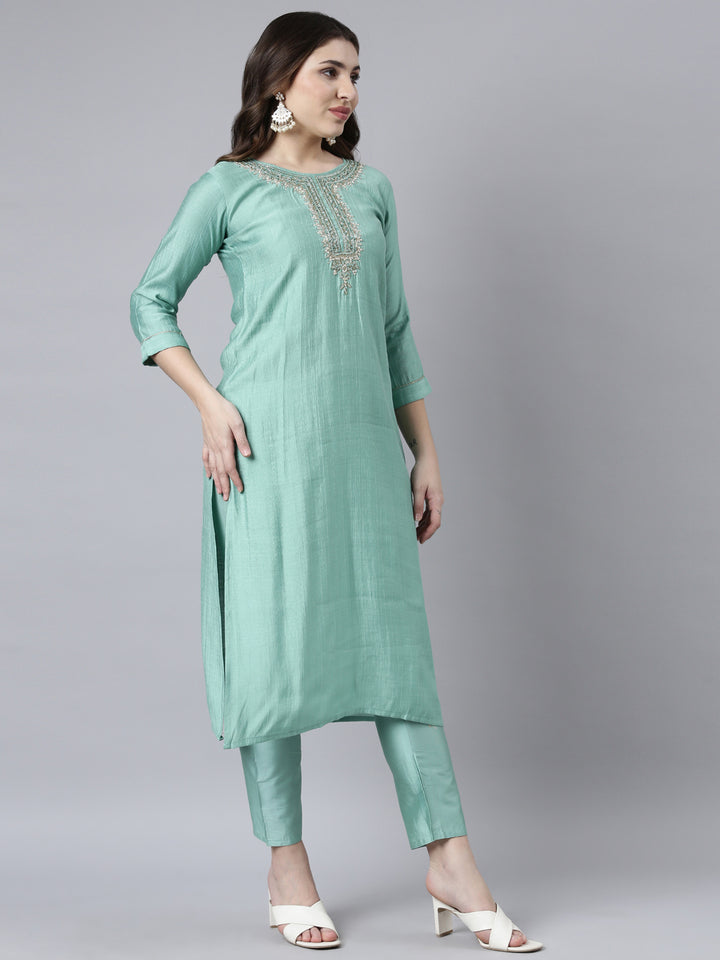 Neerus Green solid straight suit set with dupatta - back view