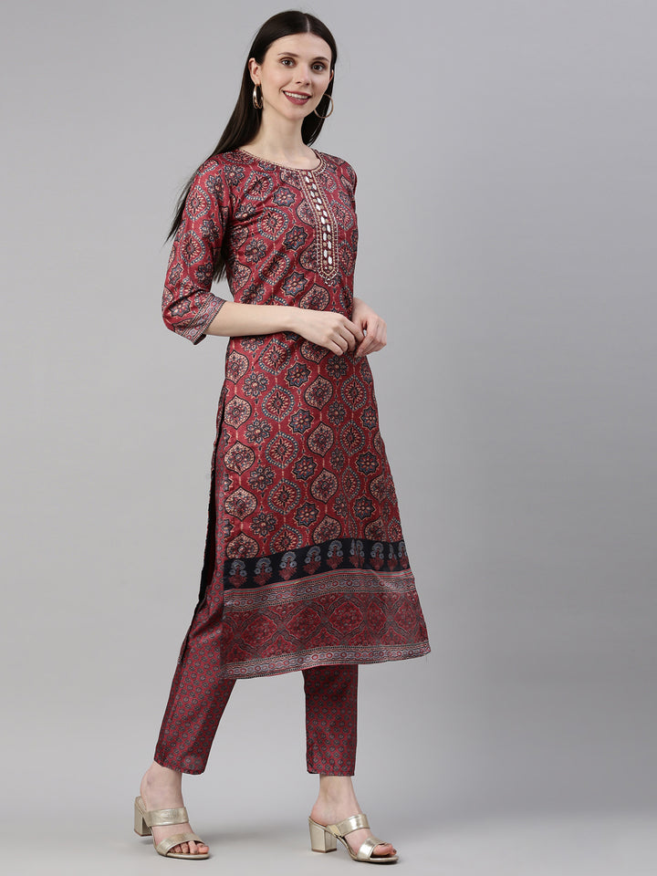 Neerus Maroon silk mirror work kurta set - side view