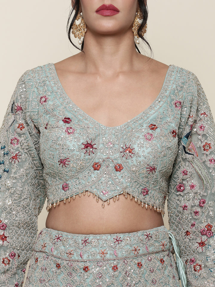 Sea green net heavy embroidered Three piece ghagra set