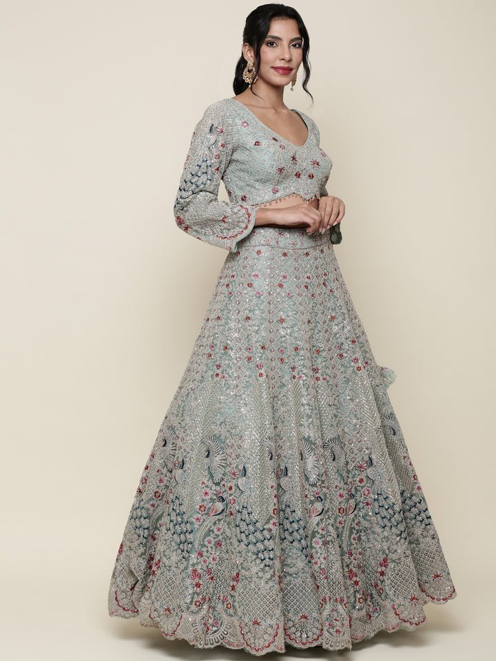 Sea green net heavy embroidered Three piece ghagra set