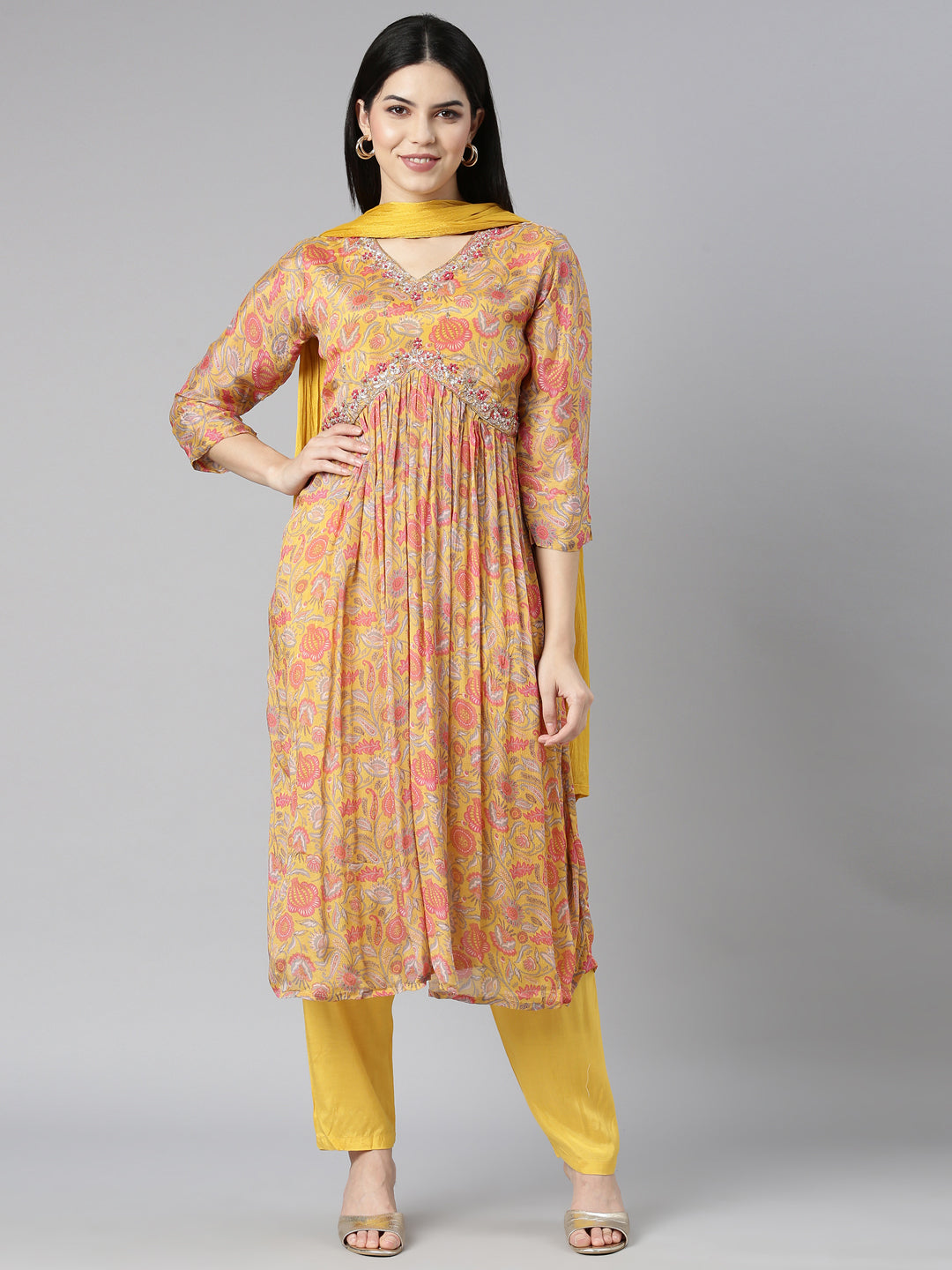 Neerus Yellow printed floral kurta set with trouser and dupatta - front view