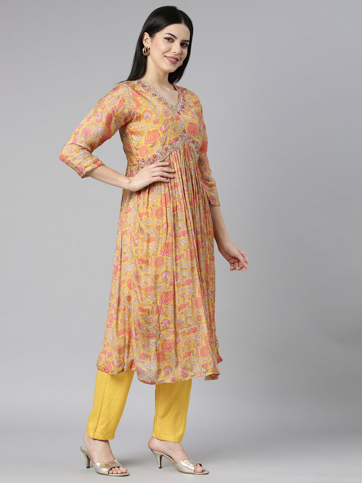 Neerus Yellow printed floral kurta set with trouser and dupatta - back view