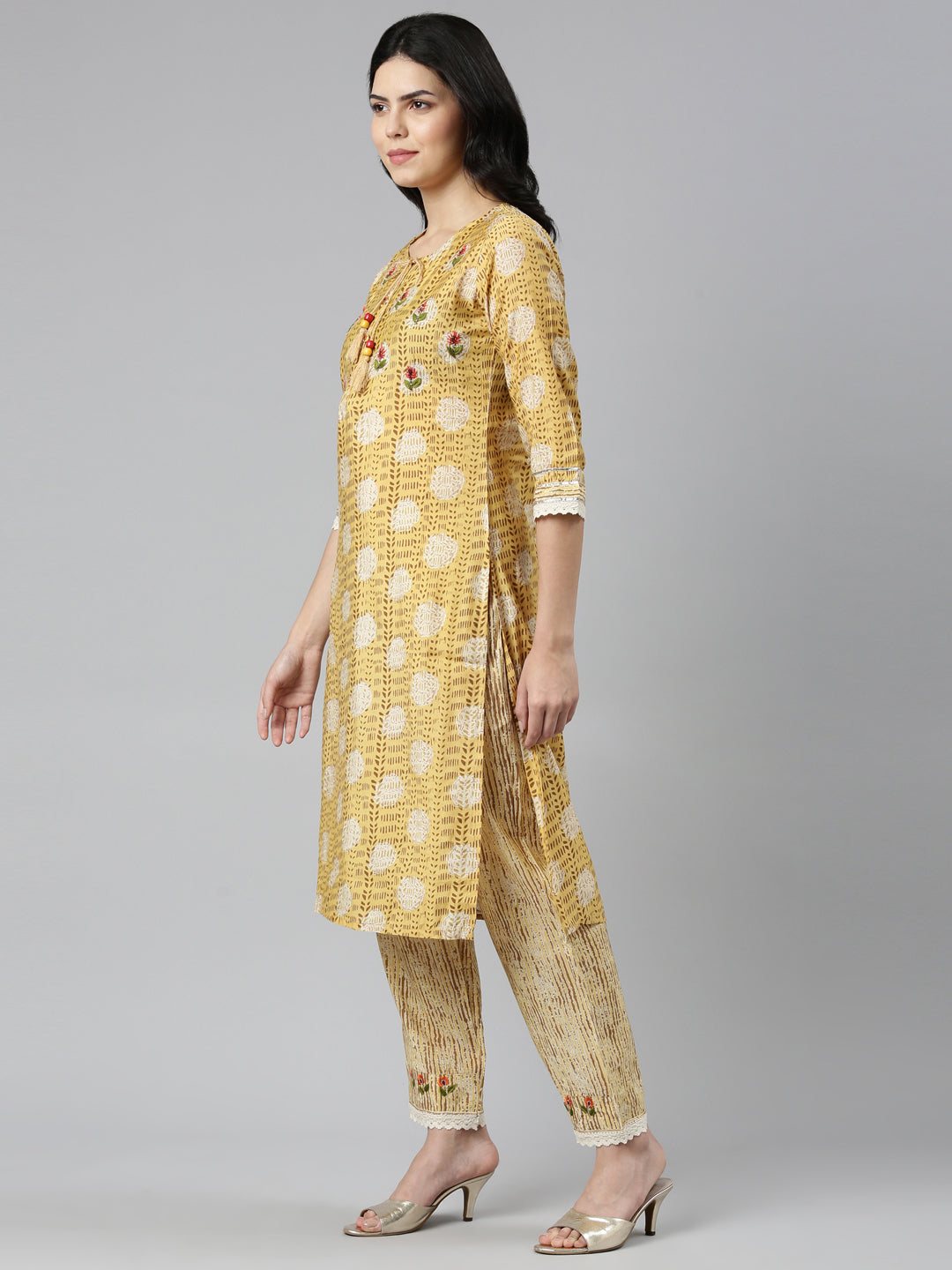 Neeru's Mustard Regular Straight Printed Kurta And Trousers With Dupatta