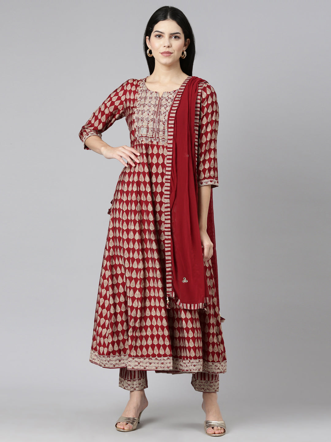 Neerus Maroon printed straight kurta set - front view