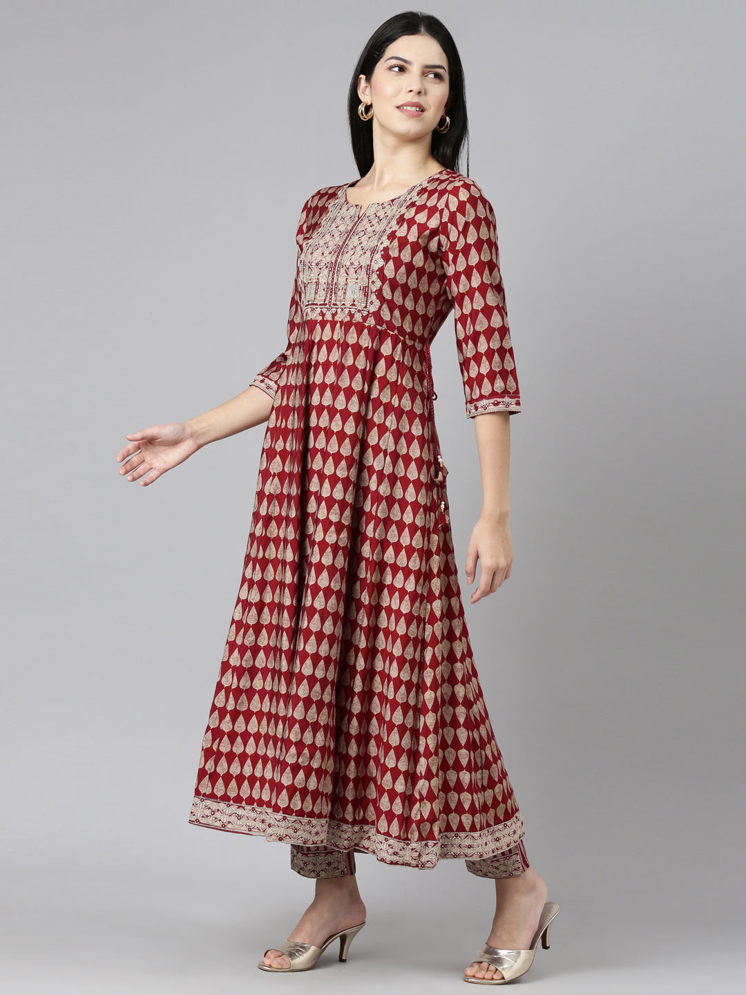 Neerus Maroon printed straight kurta set - back view