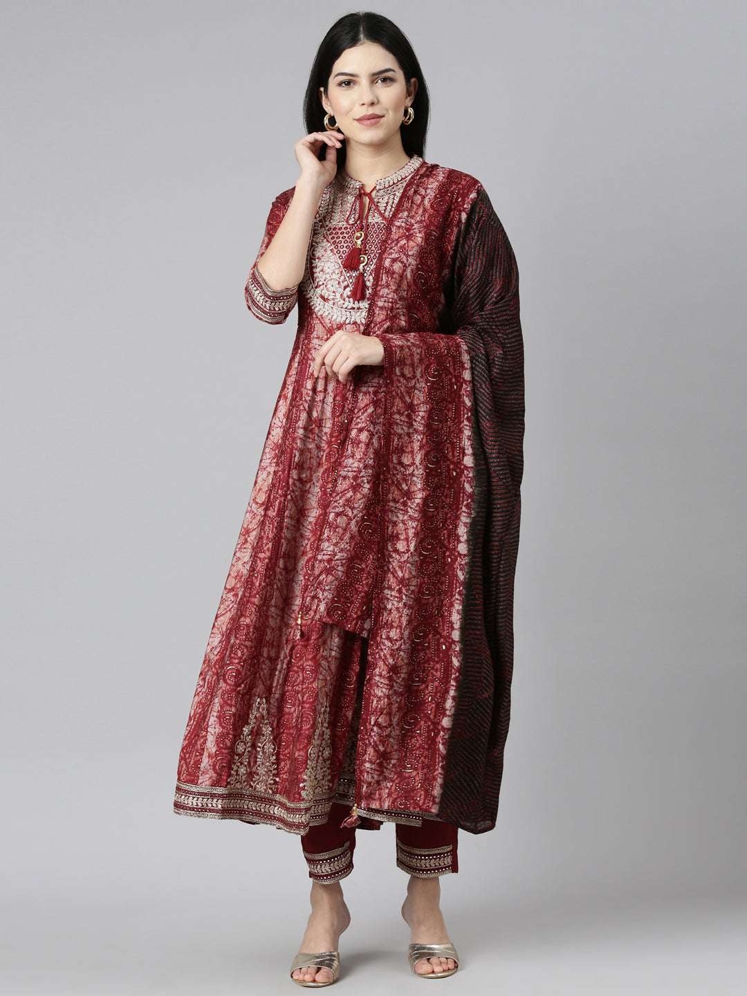 Neerus Maroon printed straight kurta set - front view