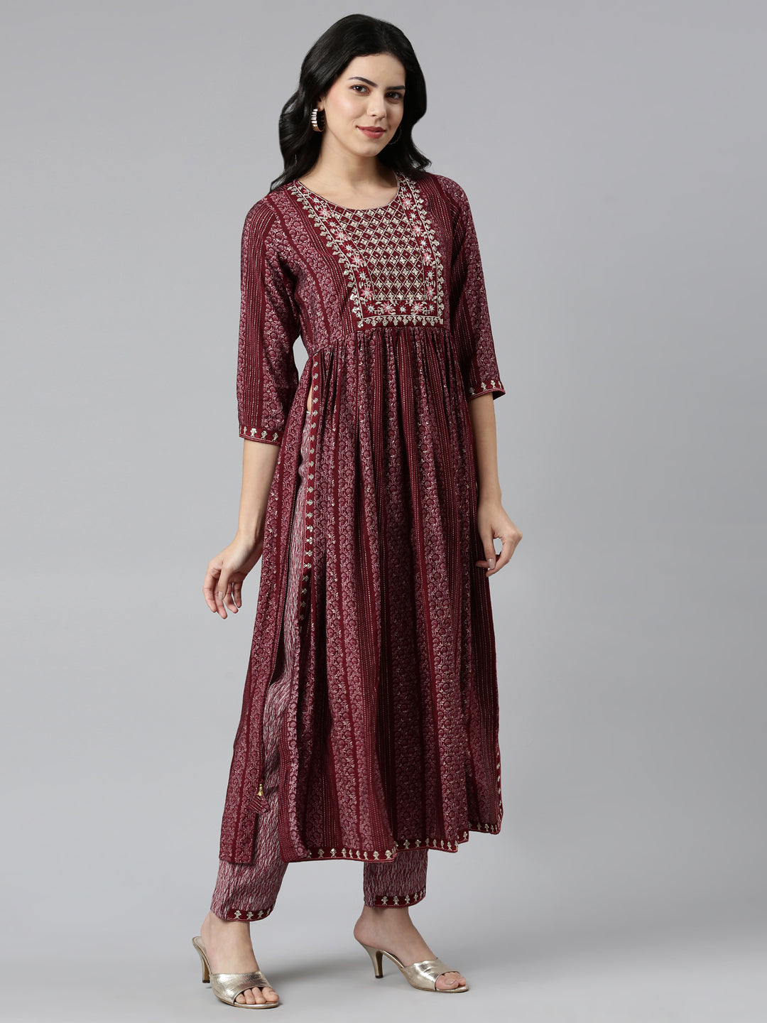 Neerus Maroon printed Nyra cut kurta set - back view