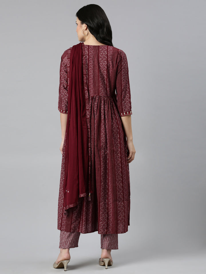 Neerus Maroon printed Nyra cut kurta set - side view