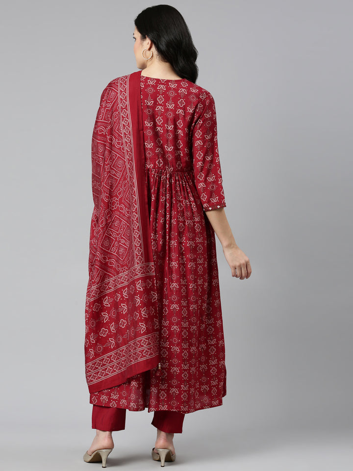 Neerus Maroon printed Nyra cut kurta set - side view