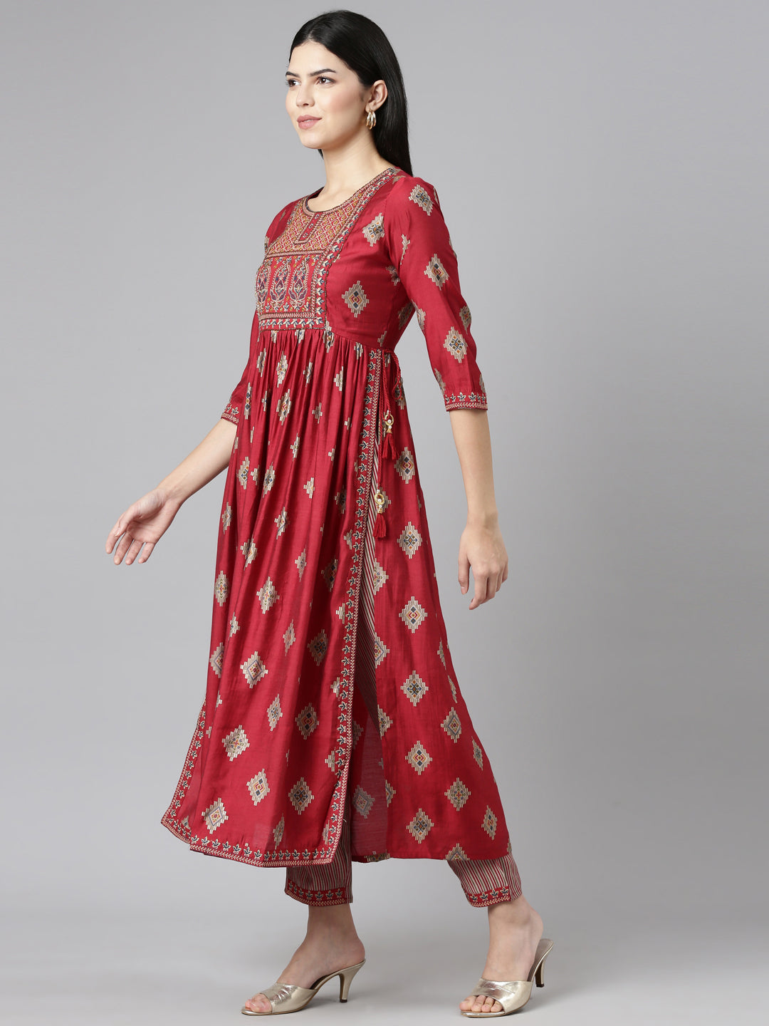 Neerus Maroon printed Nyra cut kurta set - back view
