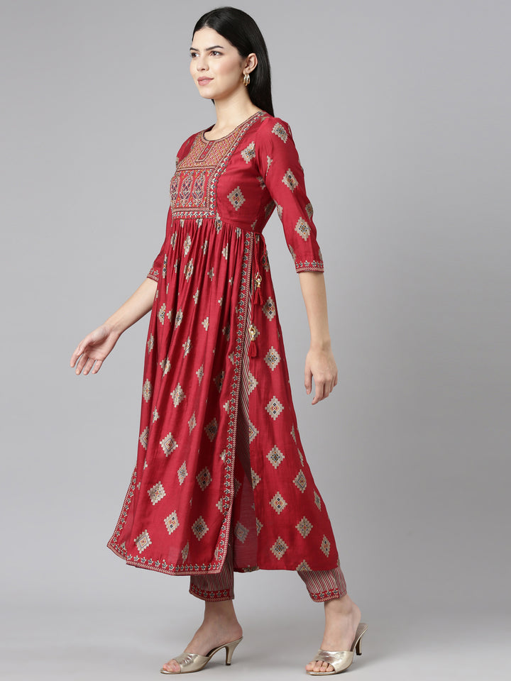 Neerus Maroon printed Nyra cut kurta set - back view