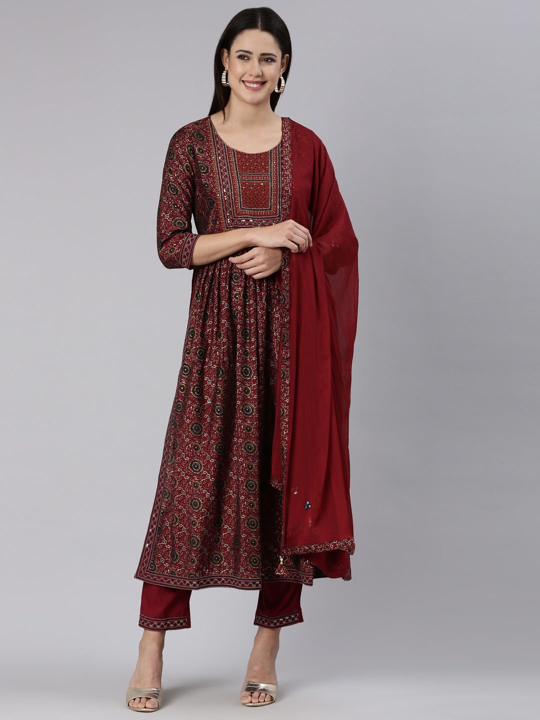 Neerus Maroon printed straight kurta set - front view