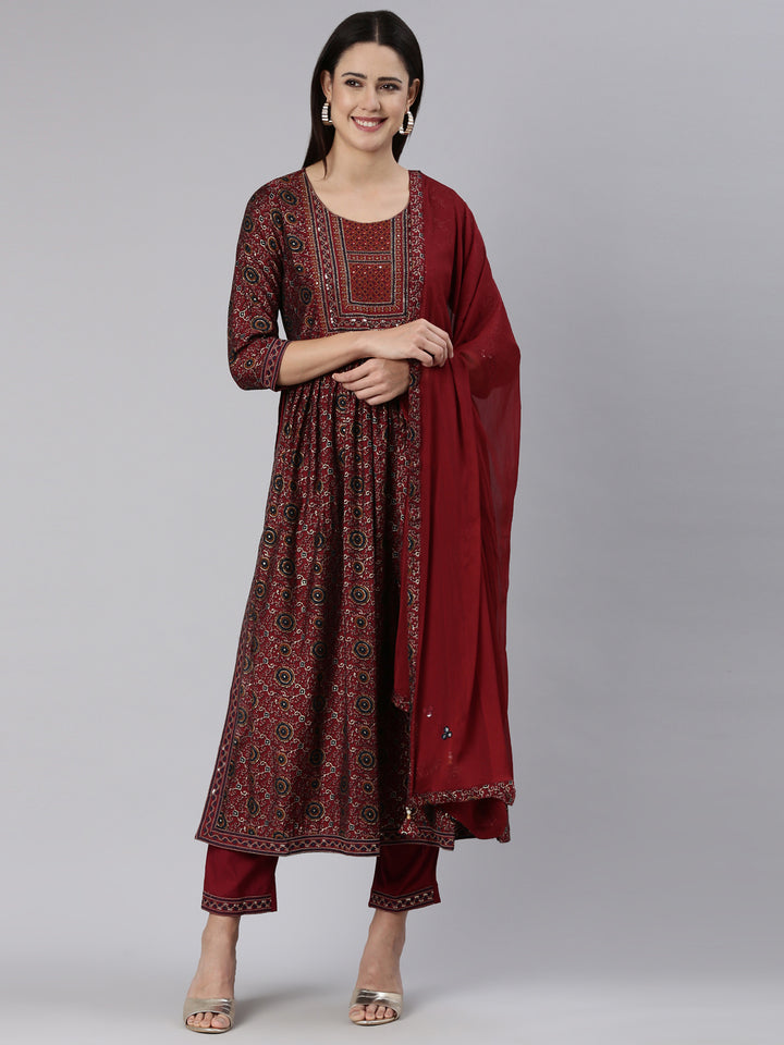 Neerus Maroon printed straight kurta set - front view