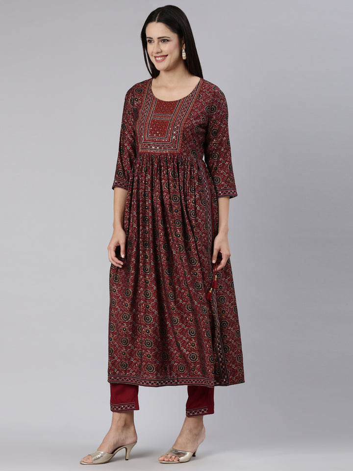 Neerus Maroon printed straight kurta set - back view