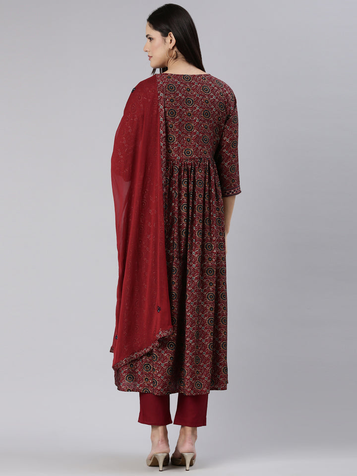 Neerus Maroon printed straight kurta set - side view