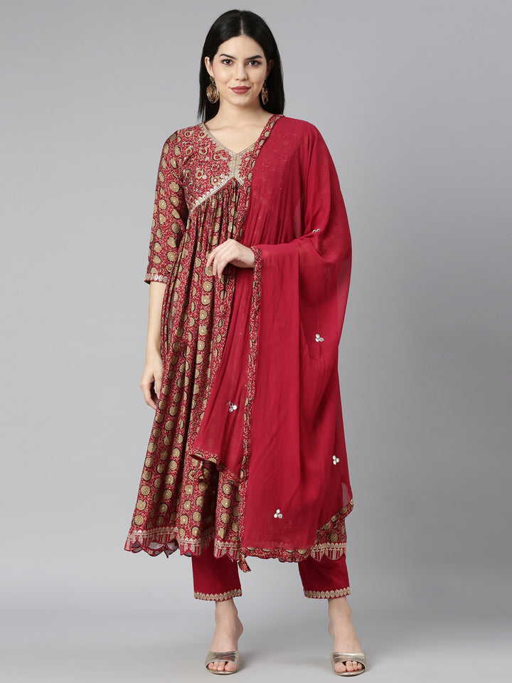 Neerus Maroon floral printed kurta set with trouser and dupatta - front view